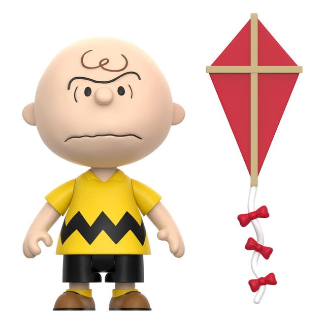Close-up of Charlie Brown ReAction Figure showing yellow shirt and classic Peanuts design