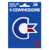 Commodore 64 embroidered iron-on patch featuring classic blue, white, and red C64 logo on blue backing card.