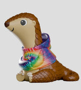 Close side view of Cosmo pangolin vinyl figure showing sculpted scales