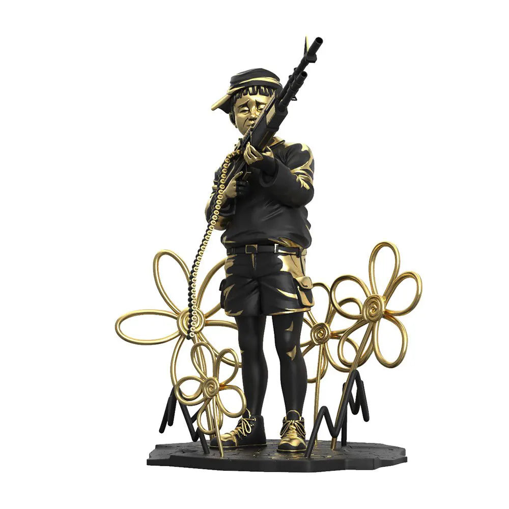 Close-up side angle of the Crayon Shooter polystone sculpture in black and gold