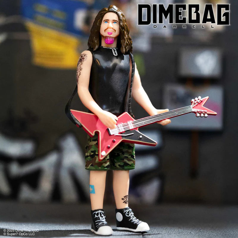 Close-up view of the Dimebag Darrell collectible figure featuring signature pink beard and guitar