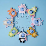 Disney YuYus Stitch plush keychain blind box series arranged in circle on blue background