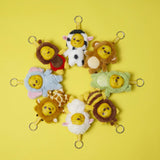 Winnie the Pooh plush keychain animal costume blind box collection displayed on yellow background