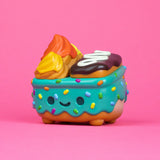 Donut-themed Dumpster Fire vinyl collectible with cruller flame