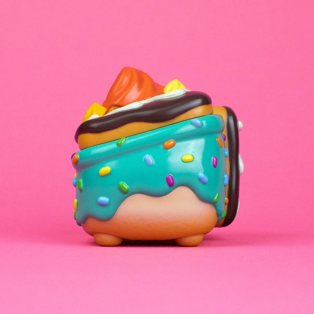 Side angle of Donut Green Dumpster Fire art toy by 100% Soft
