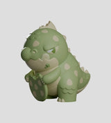 Green Dread Friends kaiju collectible figure holding a cookie