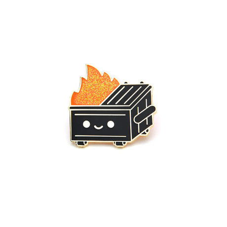 Close-up of Dumpster Fire Black & Gold enamel pin with polished gold plating and glitter flame