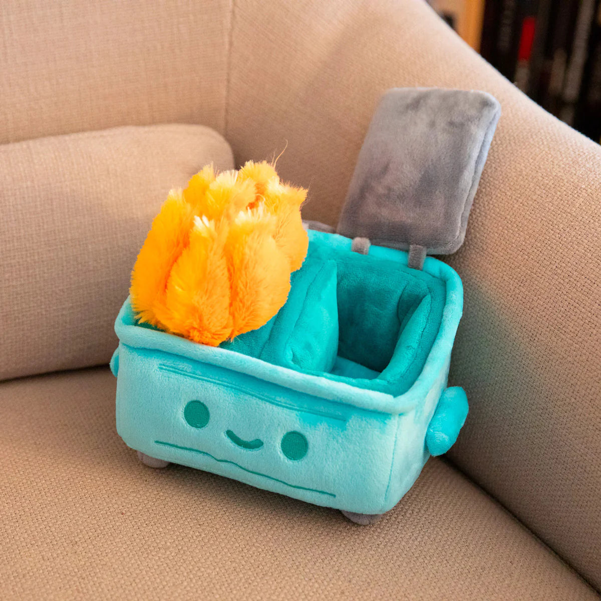 dumpster fire plush open compartment storage feature