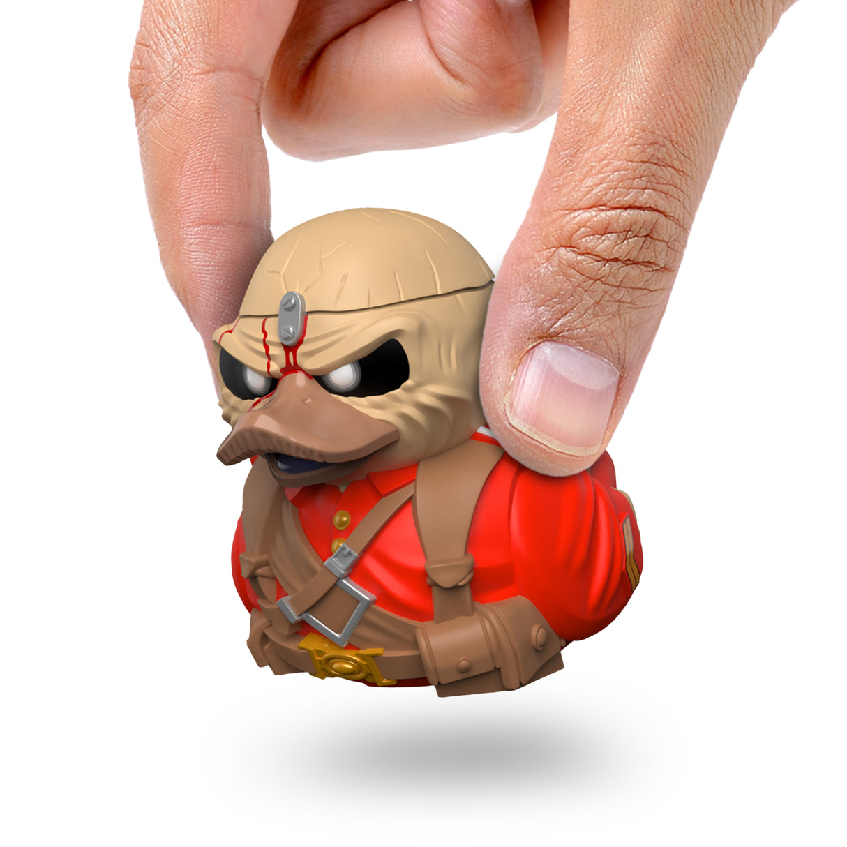 Eddie The Trooper Mini TUBBZ being held between fingers to show size.