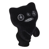 Black Fuggler motion-activated vinyl figure with sound and human-like teeth.