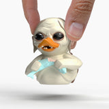Gollum Mini TUBBZ duck being held between fingers, showing detailed face and fish