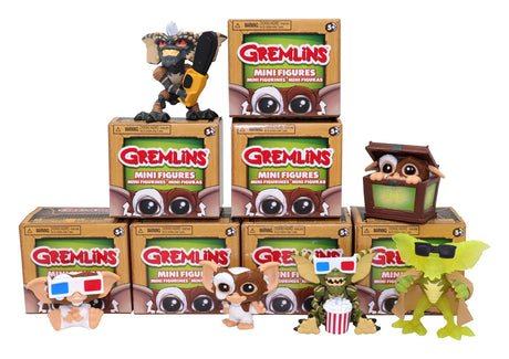 Display of multiple Gremlins Blind Box Wave 1 packages and figures including Stripe and Gizmo.