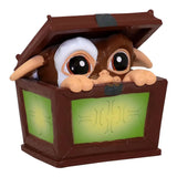 Gizmo peeking out of a wooden box mini figure from Gremlins Blind Box Wave 1.