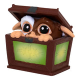 Gizmo peeking out of a wooden box mini figure from Gremlins Blind Box Wave 1.