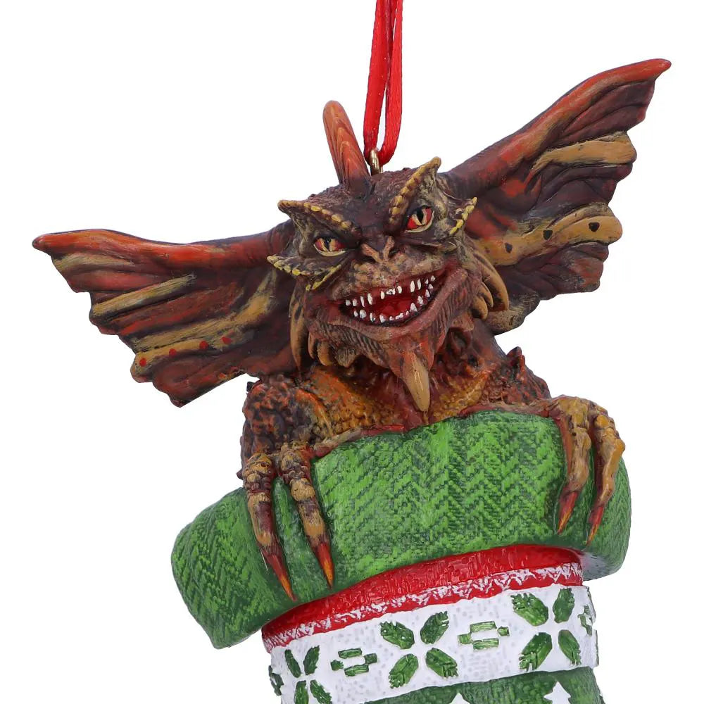 Close-up of Mohawk Gremlin peeking from a Christmas stocking