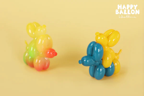 Yellow and pink gradient balloon dog collectible from Happy Balloon Dog blindbox.