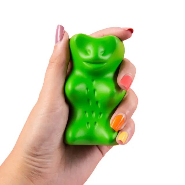 Green Haribo Gold Bear Stress Squeezer held in hand showing the classic gummy bear shape.