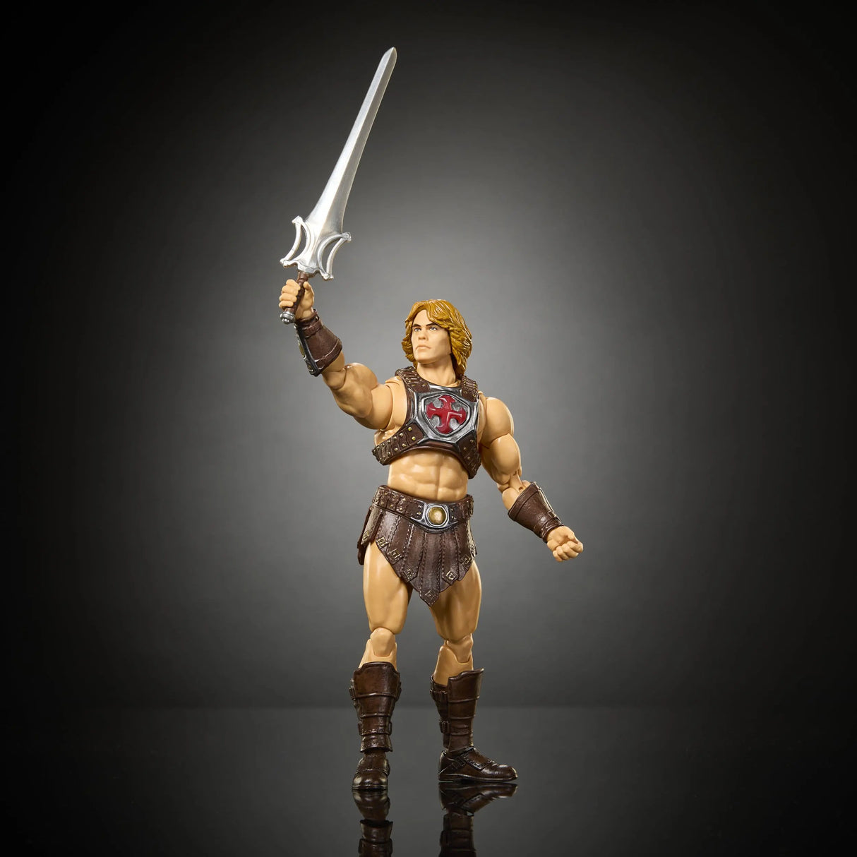 He-Man action figure wielding the Sword of Power in a heroic battle pose