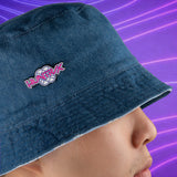 HUNTRIX pin attached to blue bucket hat