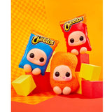 Hyojo x Cheetos blind box collection featuring three squishy plush designs on orange background.