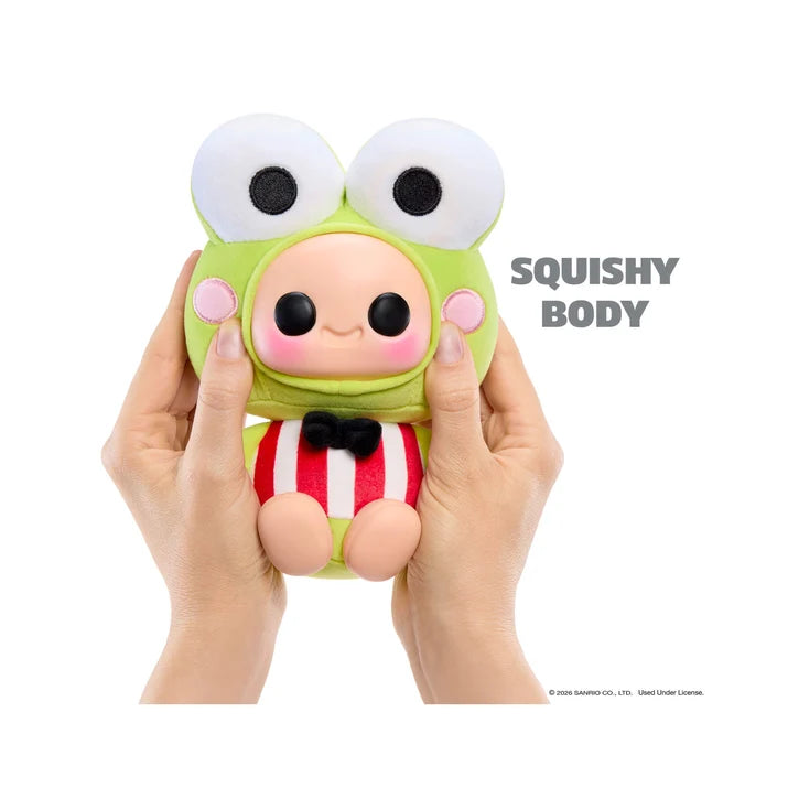 Hyojo Keroppi squishy plush figure being squeezed to demonstrate its soft green frog costume.