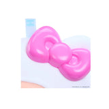 Close-up of Hello Kitty Hyojo plush featuring a glossy pink bow and soft white fabric.