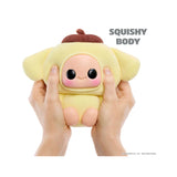 Hyojo Pompompurin squishy plush figure being squeezed to demonstrate its soft yellow puppy costume and squeezable body.