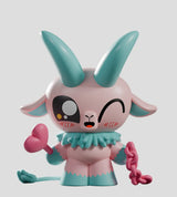Pink and turquoise Kid Krampus collectible figure holding heart wand and chain