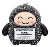 Black Composition Book designer art toy figure with white speckled notebook pattern and smiling face.