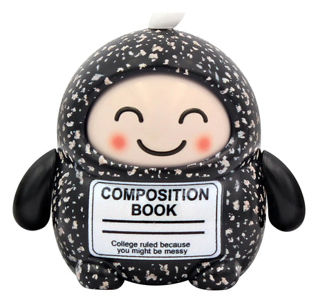 Black Composition Book designer art toy figure with white speckled notebook pattern and smiling face.