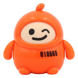 Orange winking designer art toy figure with playful expression and collectible vinyl design.