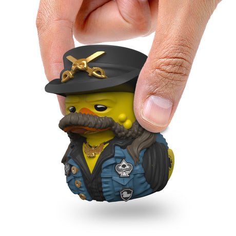 Close-up of Lemmy Mini TUBBZ figure being held between fingers