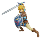 Link action figure in a battle pose with the Master Sword raised and Hylian Shield equipped.