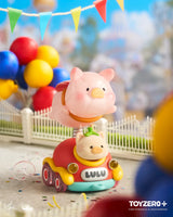 LuLu The Piggy riding a playful carnival bumper car attraction with a floating pig balloon