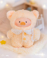 Cream-colored LuLu The Piggy Dreaming Wonderland plush holding a pillow in cozy bedtime attire