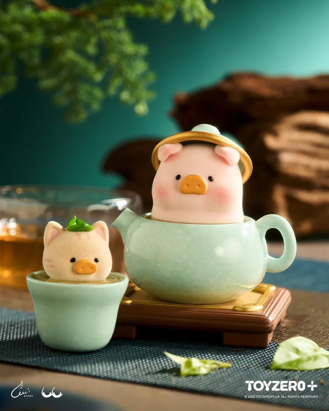 LuLu the Piggy tea set figure with matching teapot and teacup companion.