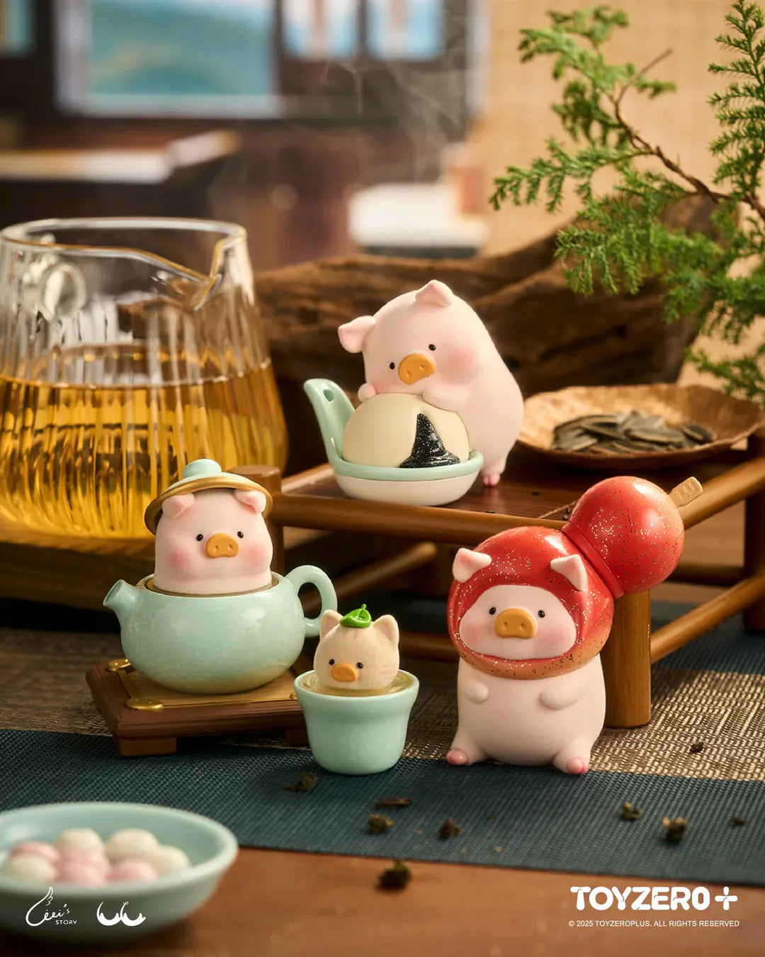 LuLu the Piggy tea party lifestyle display featuring multiple figures.