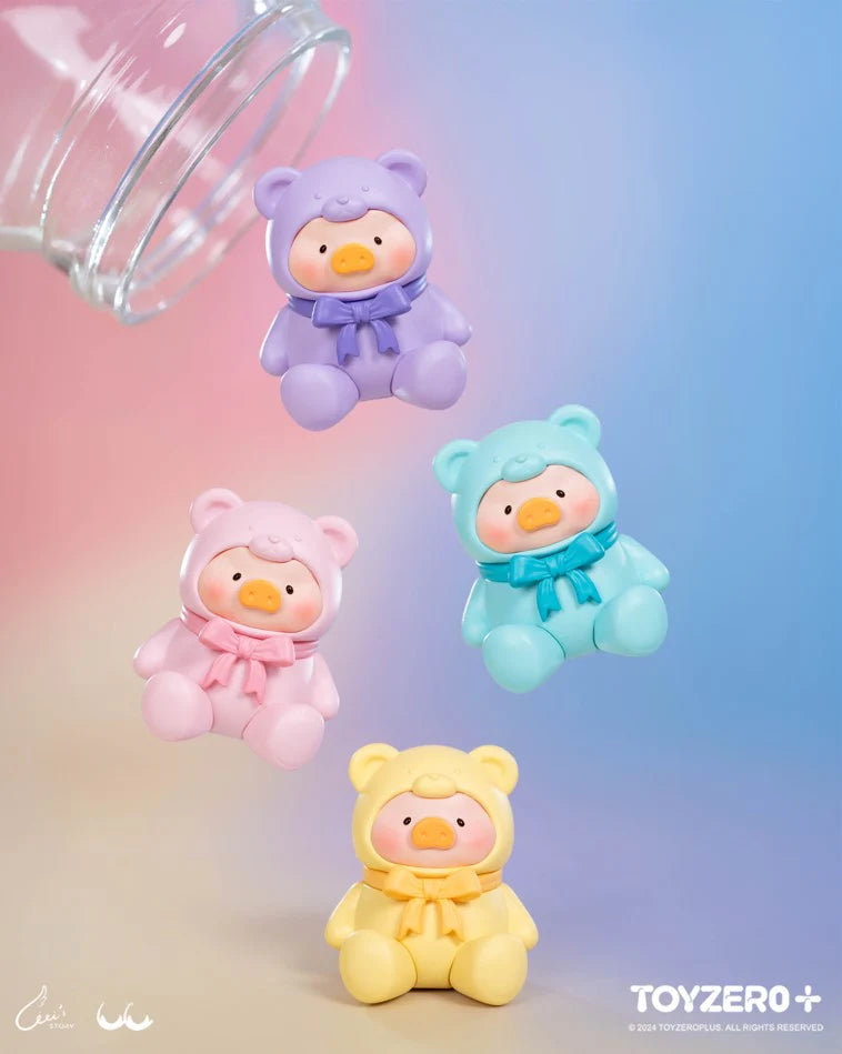 Pastel colored LuLu The Piggy Teddy Mini figures in pink, purple, blue, and yellow bear costumes
