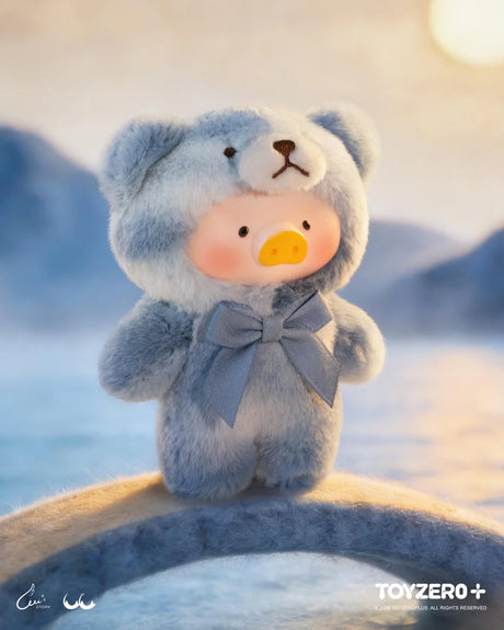 LuLu The Piggy wearing a soft blue teddy bear costume with matching bow from the Whispers of Nature Series