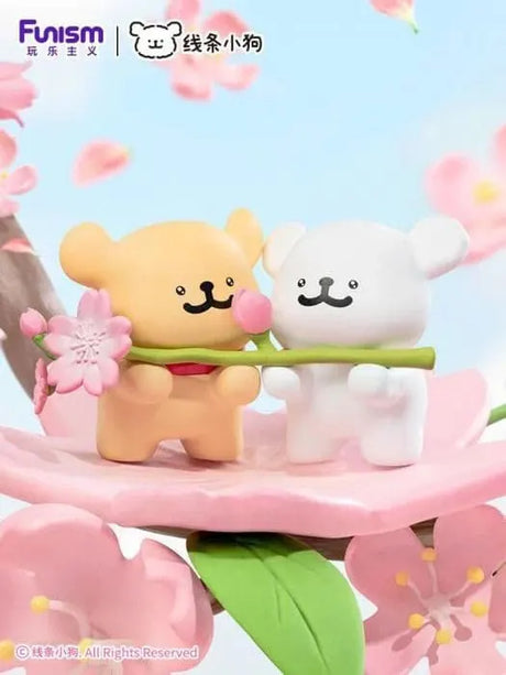 Maltese Cherry Blossoms Series Blind Box Blossoms Together figure holding a cherry blossom branch beneath blooming sakura trees