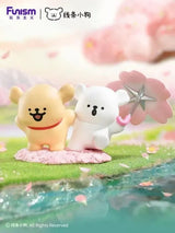 Maltese Cherry Blossoms Series Blind Box Joyful Spring figure with cherry blossom umbrella beside a river