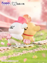 Maltese Cherry Blossoms Series Blind Box Sakura Express figure riding miniature train tracks surrounded by cherry blossoms