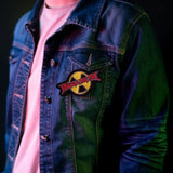 Megadeth radioactive logo patch applied to a denim jacket front pocket