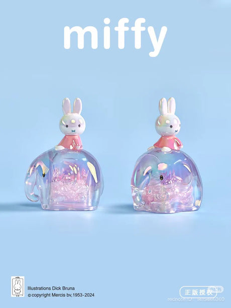 Two Miffy Elephant Series figures with pink-themed translucent elephants and sparkling crystal interiors