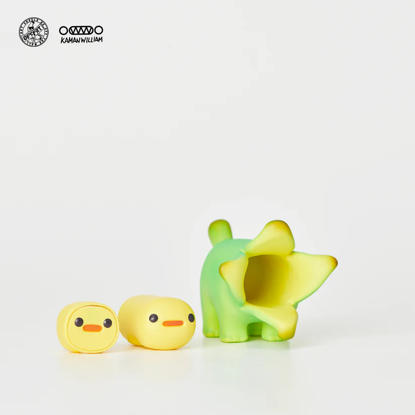 Two interchangeable faces included with Bananaers Dog figure