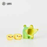 Two interchangeable faces included with Bananaers Dog figure