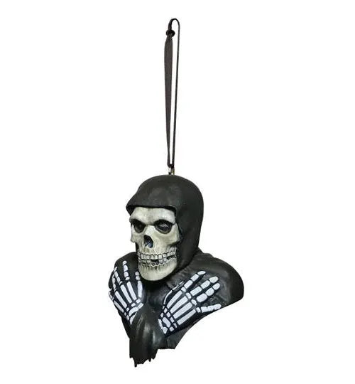 Officially licensed Misfits Fiend hanging ornament showing sculpted skull and skeletal hands, left-side view