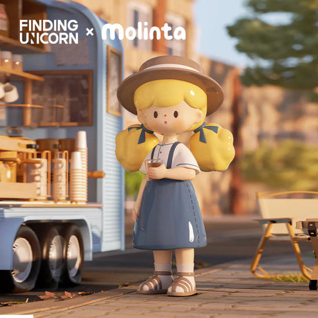 Molinta coffee break figure standing beside a coffee truck with a hot drink