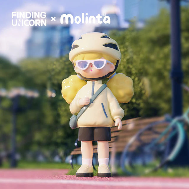 Molinta cycling figure wearing a helmet and sunglasses during an outdoor adventure