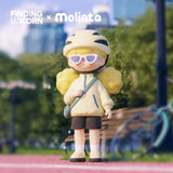 Molinta cycling figure wearing a helmet and sunglasses during an outdoor adventure